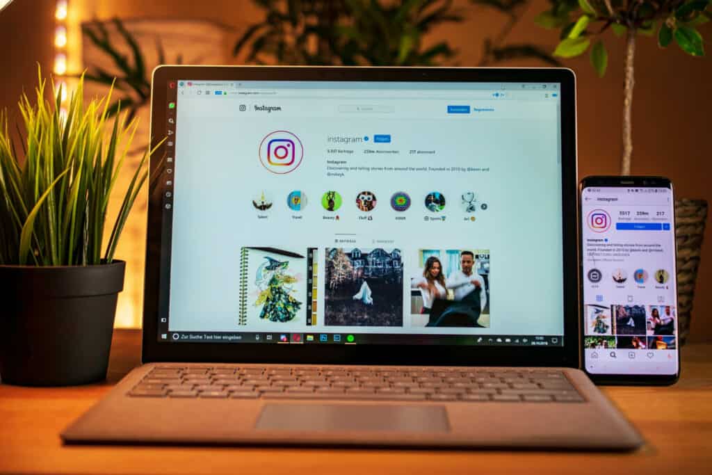 Instagram App Open On Laptop and Cellphone