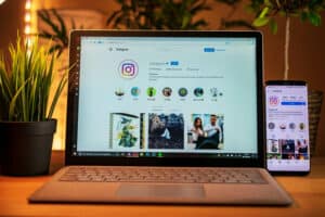 Instagram App Open On Laptop and Cellphone