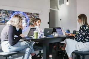 3 Woman Working At Table