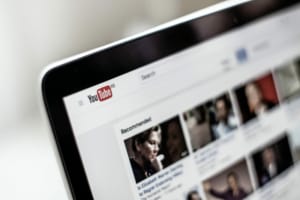 Laptop Showing YouTube Home Page