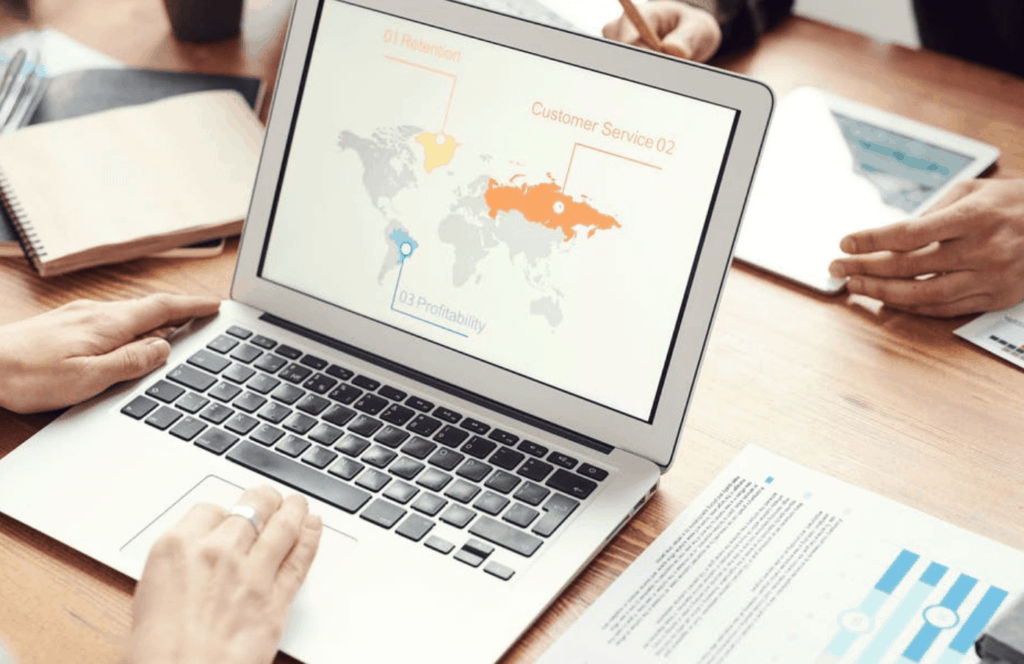 Laptop screen showing global business map
