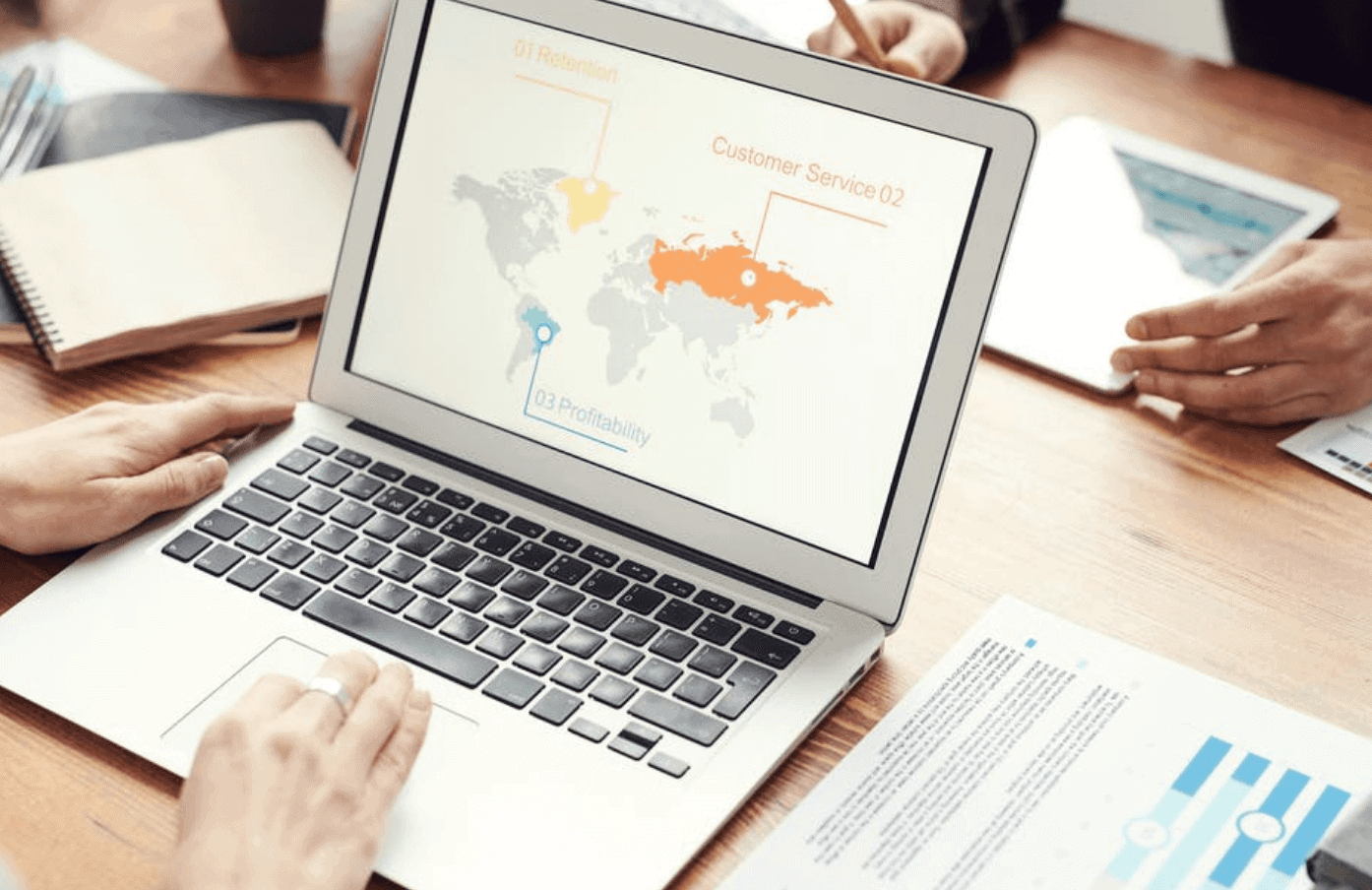 Laptop screen showing global business map