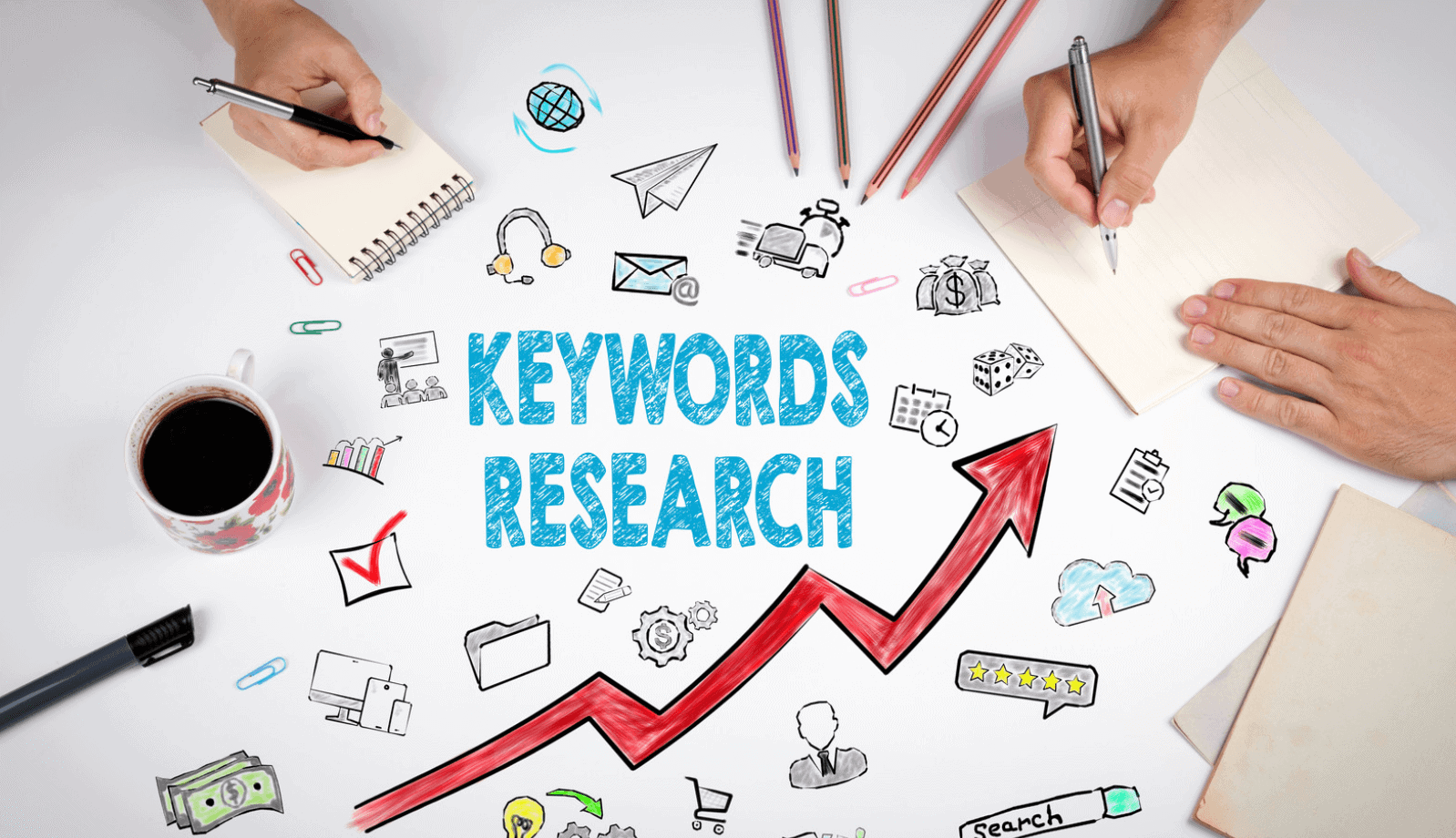Keyword research graphic with people writing notes around it