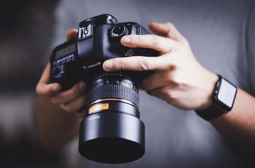 Person holding a camera